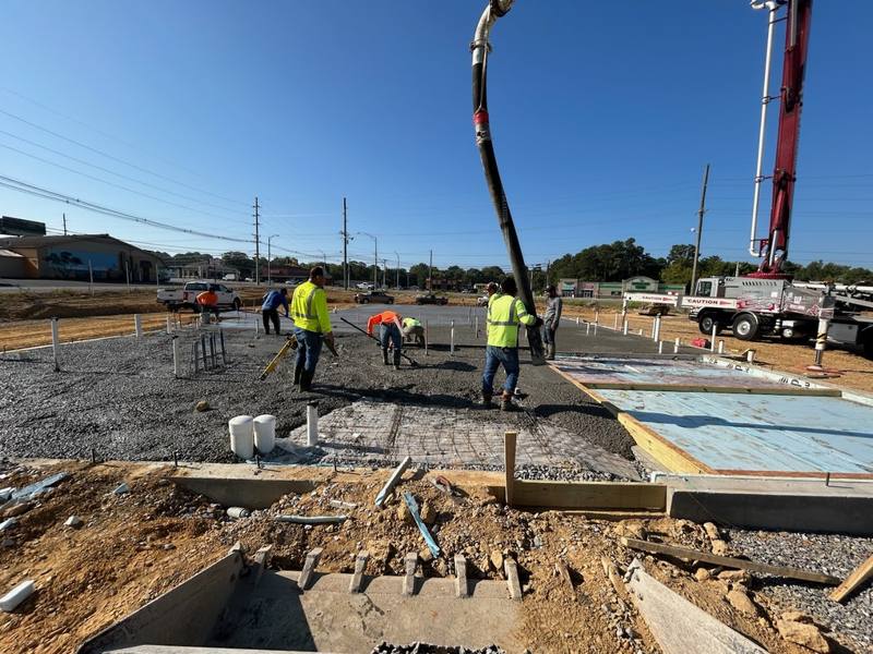Concrete pump placing a slab pour