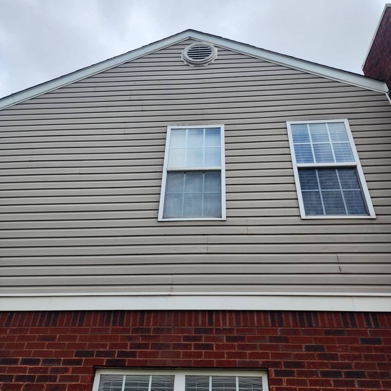 Gable siding after storm damage repair in Owens Cross Roads, AL