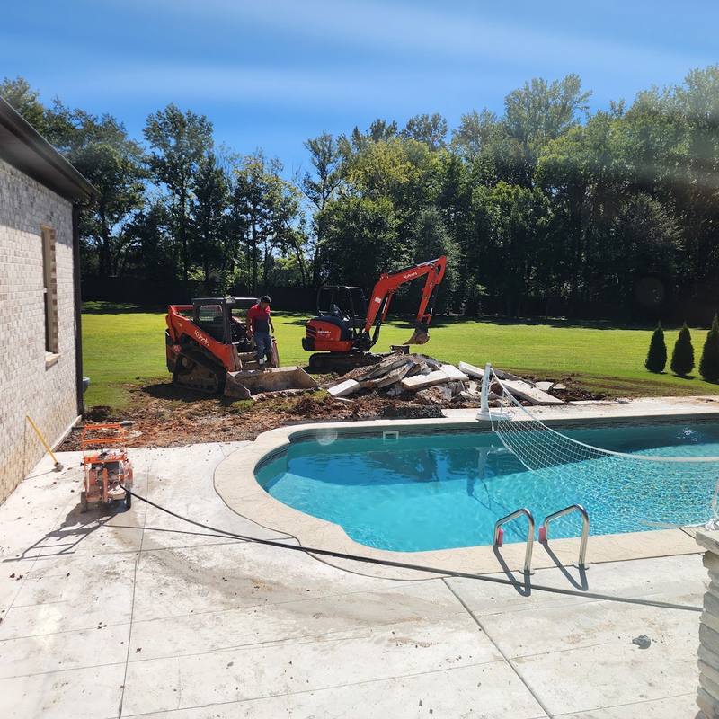 Excavation and preparation around a pool deck