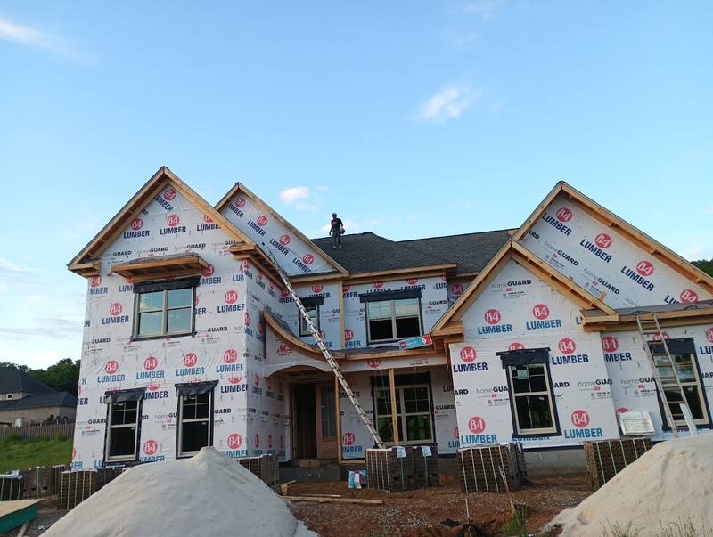 House wrap installed before new siding on a new home
