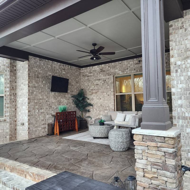 Stamped concrete patio under a covered porch in Huntsville, AL